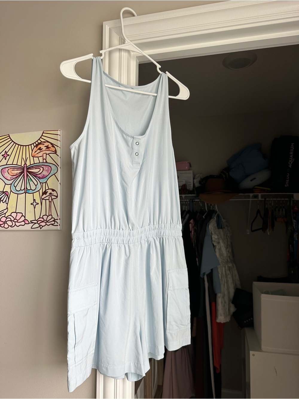 Vuori Pale Blue Sleeveless Romper with Front Buttons
